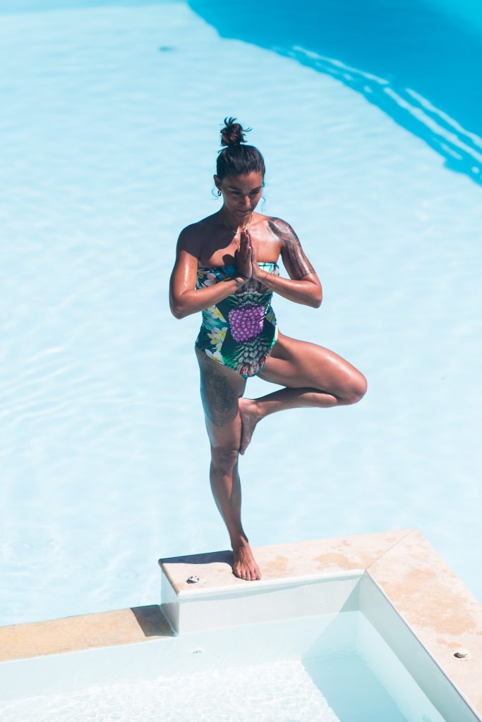 Yoga woman in pool